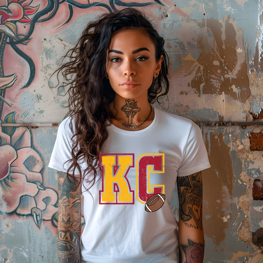 KC with Football Tee